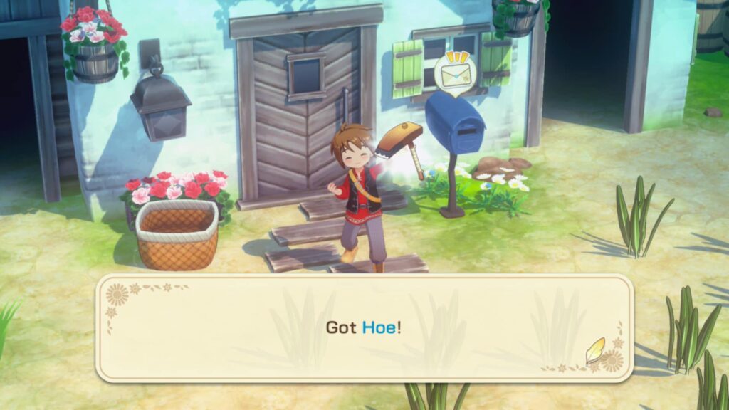 Screenshot from Story of Seasons: Grand Bazaar showing a smiling character holding a hoe outside a cottage, with flowers, a mailbox, and the on-screen message “Got Hoe!”