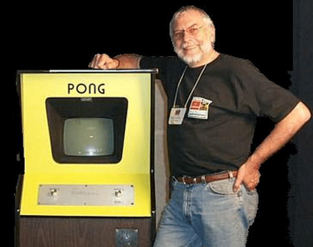 Bushnell next to a Pong Arcade cabinet 