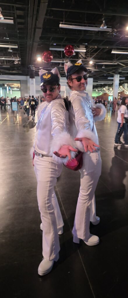 photo of two cosplayers as moogles